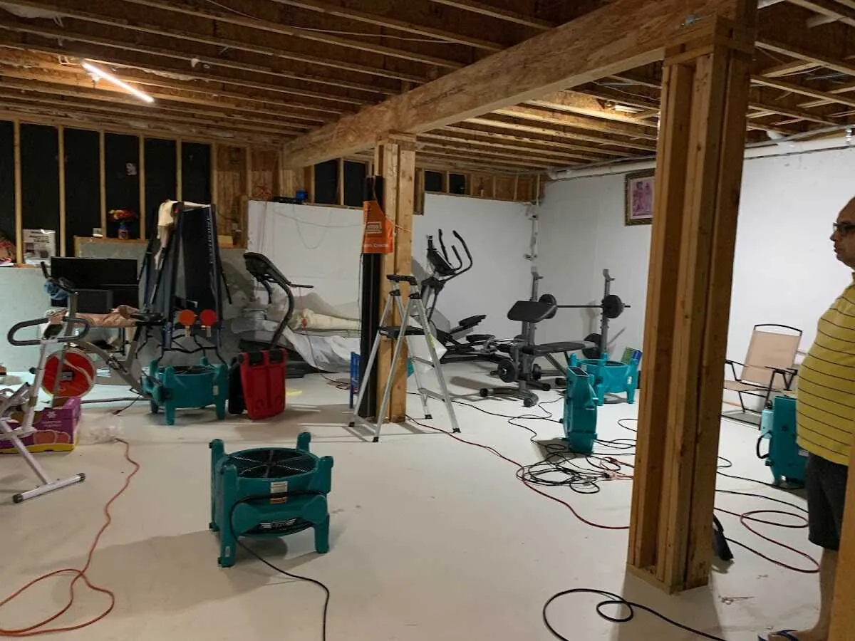 Basement drying equipment setup for Contents Cleaning & Restoration in Tewksbury