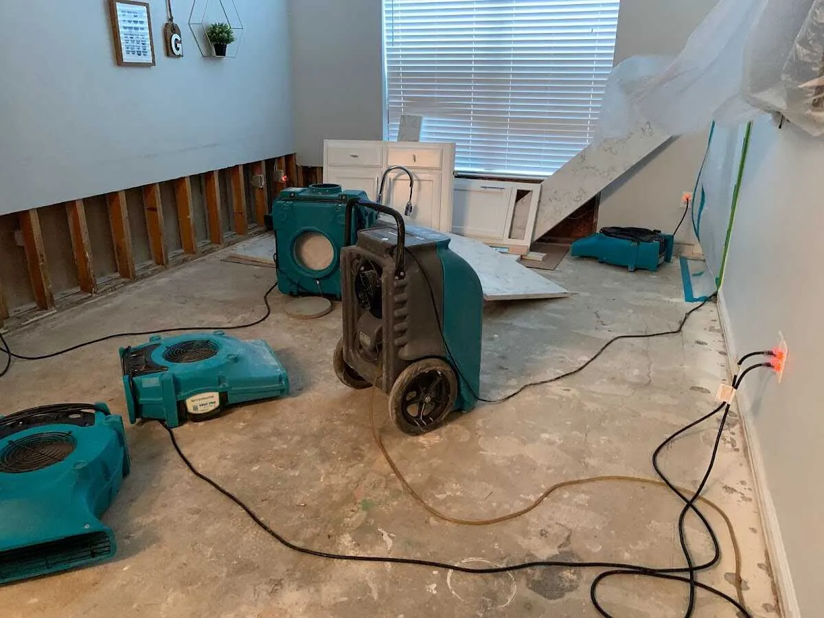Dehumidifier in flood-cut room for Water Damage Restoration in Tewksbury